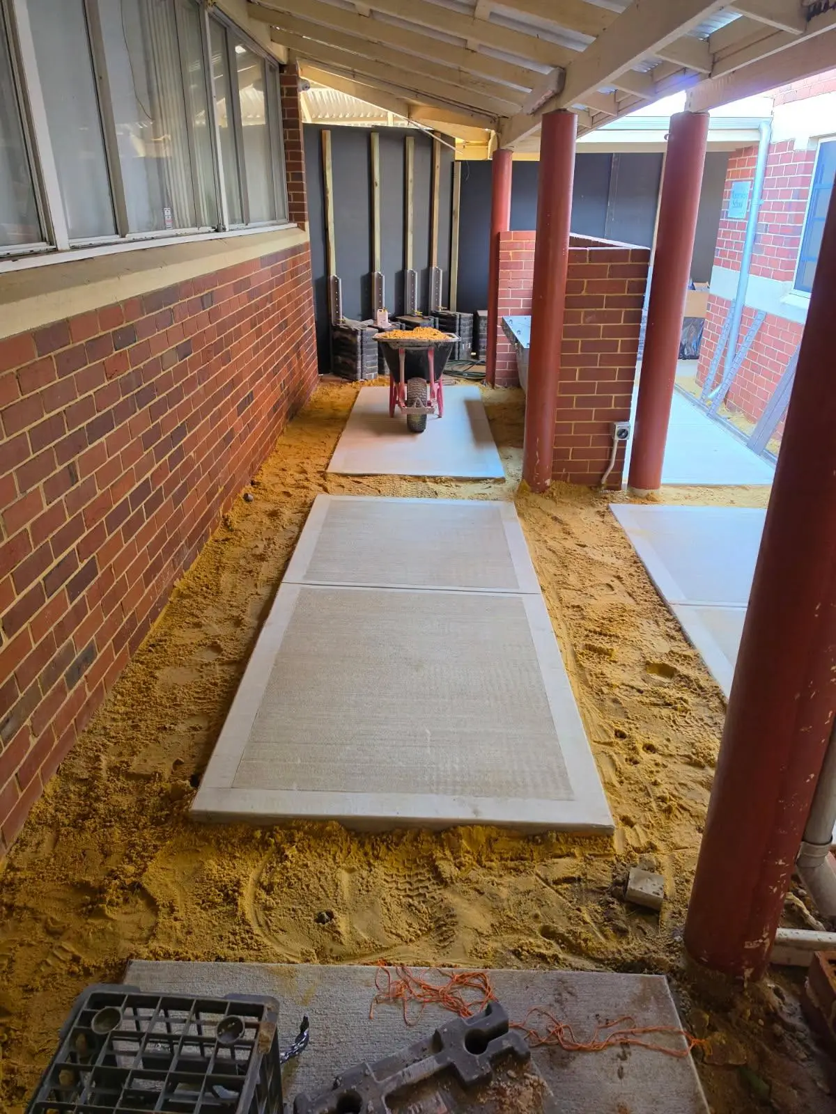Brushed grey panels with picture frame edging, ready for paving surrounds