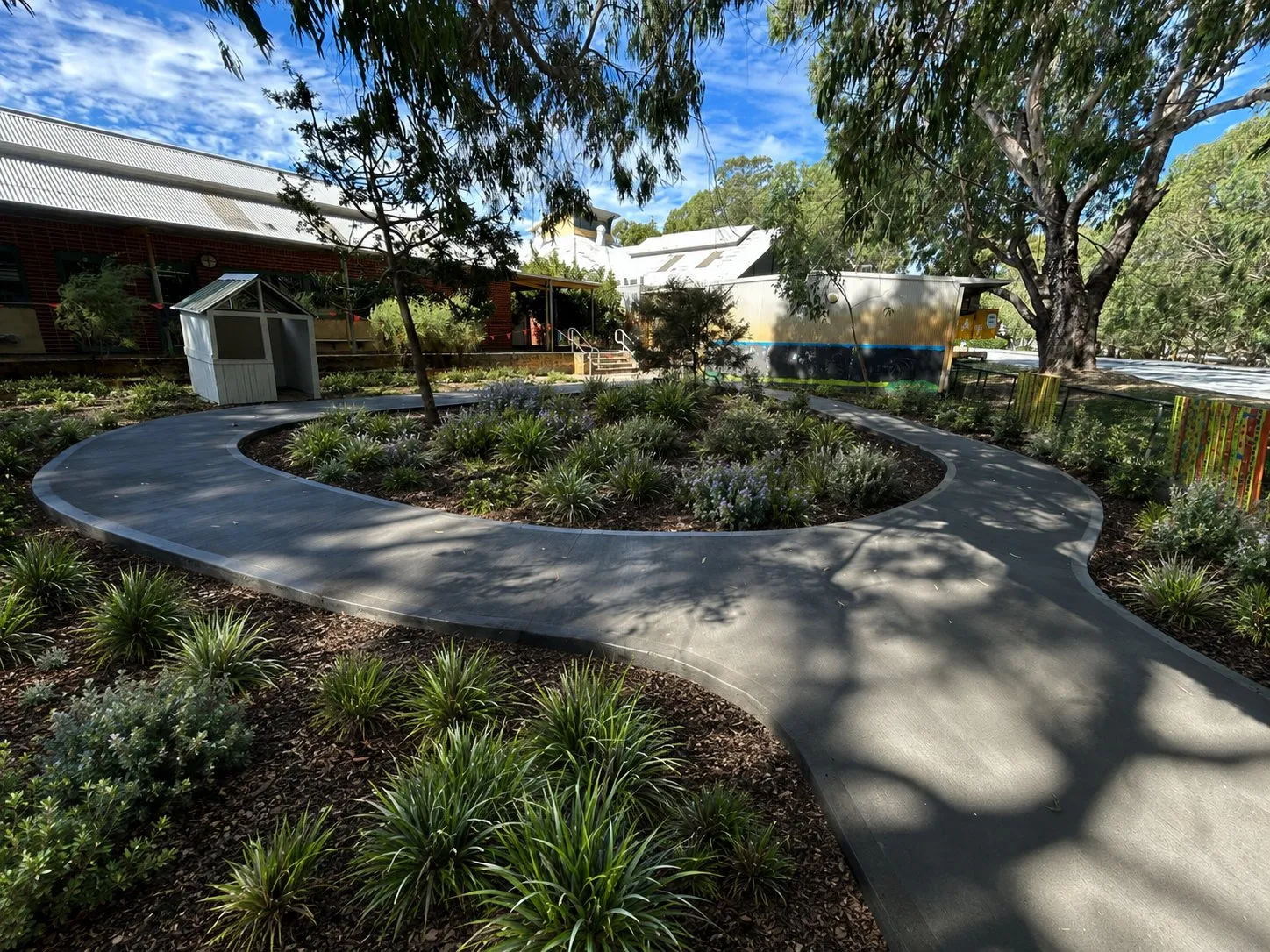 Charcoal coloured community path in Woodbridge by Flow Form